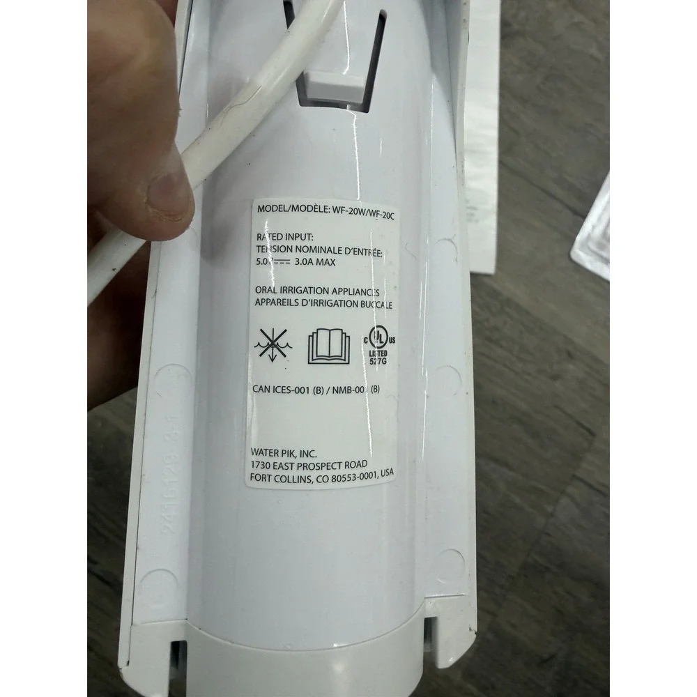 Waterpik Cordless Pulse 3100 Rechargeable Portable Water Flosser With 2 New Tips